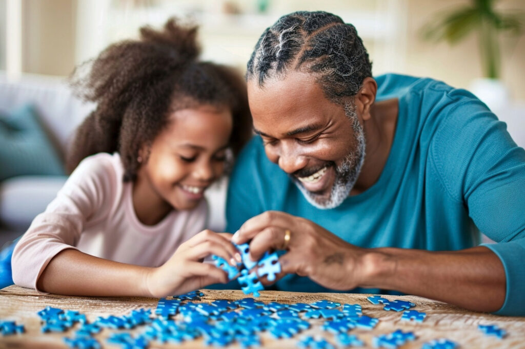 parent jouant avec son enfant ou faisant une activité créative ensemble